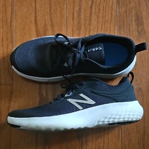 New Balance Women's Black and White Sneakers